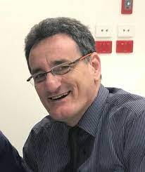 Dr Michael Coroneos